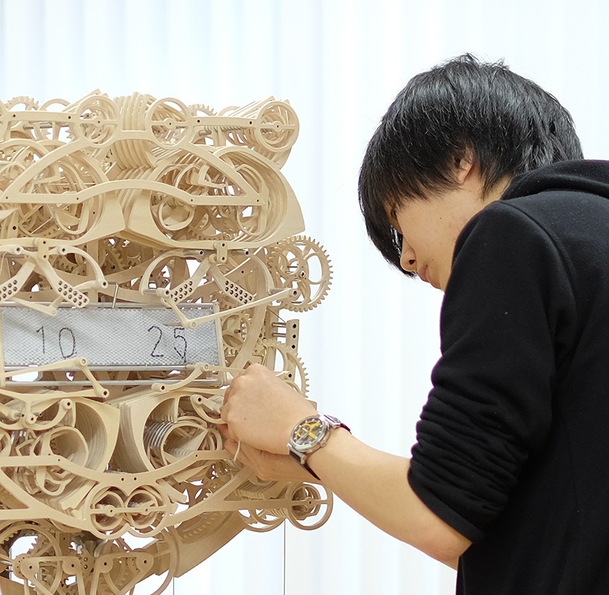 Art student’s 407-piece hand-carved wooden clock (2016)