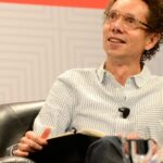 Malcolm Gladwell opposes WFH while he works from his couch for the last 20 years