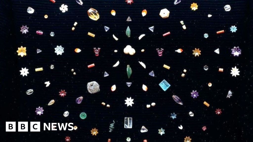 Jewels linked to Buddha remains go to auction, sparking ethical debate